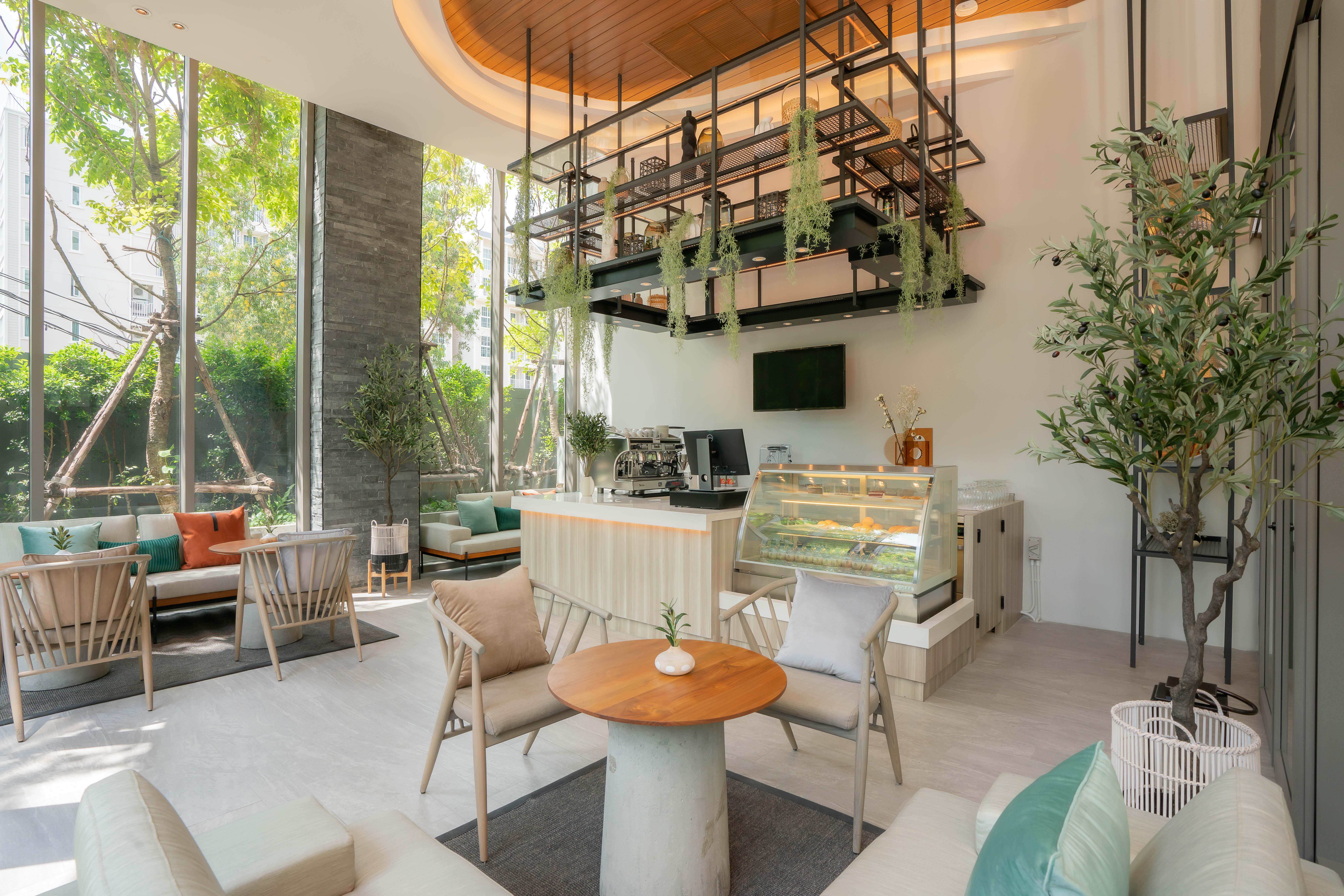 Bayphere Hotel Pattaya Jc Na Chom Thian Bagian luar foto The Living Room, the hotel's lobby lounge